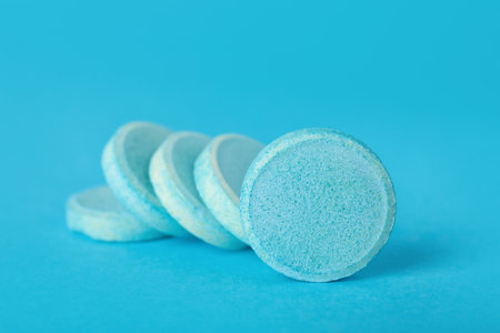 Soluble tablets on blue backgroundの写真素材
