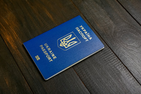 Ukrainian passport on black wooden backgroundの写真素材