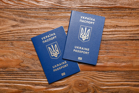 Ukrainian passports on wooden backgroundの写真素材