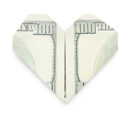 Origami heart made of dollar banknote on white backgroundの写真素材