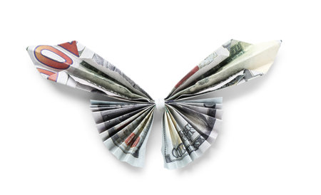 Origami butterfly made of dollar banknotes on white backgroundの写真素材