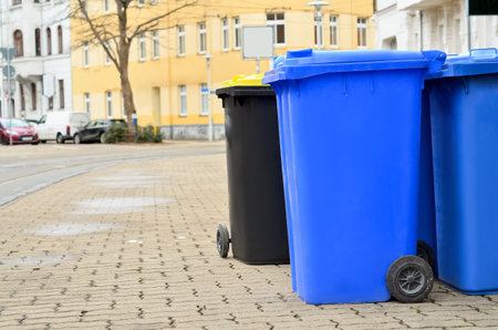Garbage containers on city streetの写真素材