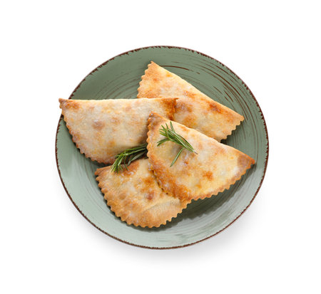 Plate of baked meat empanadas and rosemary on white backgroundの写真素材
