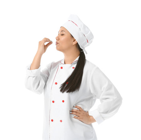Beautiful Asian chef on white backgroundの写真素材
