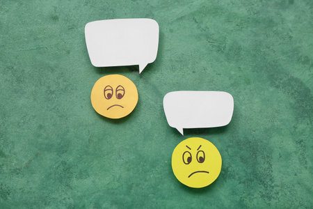 Sad faces with speech bubbles on grunge background. Dialogue concept