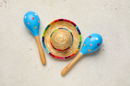 Mexican maracas with sombrero hat on white backgroundの写真素材