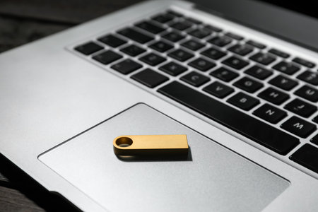 USB flash drive on modern laptop, closeupの写真素材