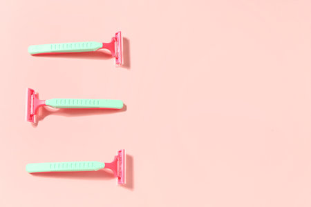 Safety razors on pink backgroundの写真素材