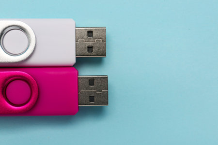 USB flash drives on color background, closeupの写真素材