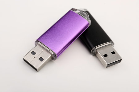 USB flash drives on white background
