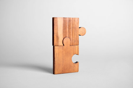 Pieces of jigsaw puzzle on light background. unity concept