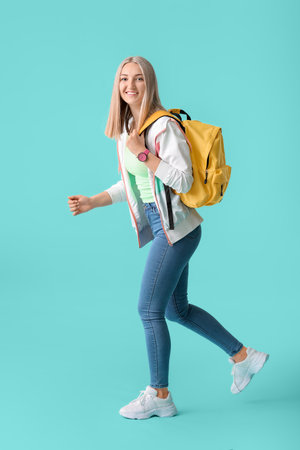 beautiful student on color backgroundの写真素材