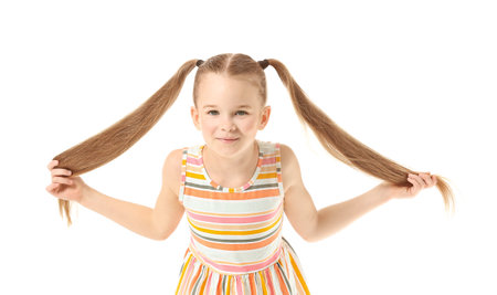 Cute little girl on white backgroundの写真素材