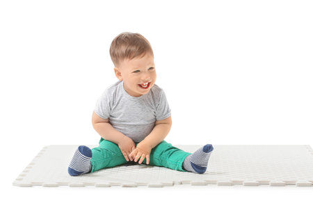 Cute little boy on white backgroundの写真素材