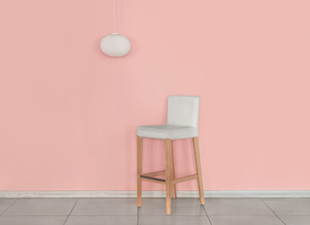 Chair with lamp in empty roomの写真素材