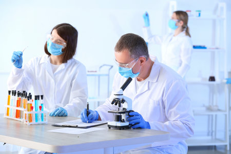 Scientists working in modern laboratoryの写真素材