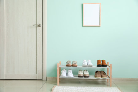 Stylish interior of modern hall with shoes on standの写真素材