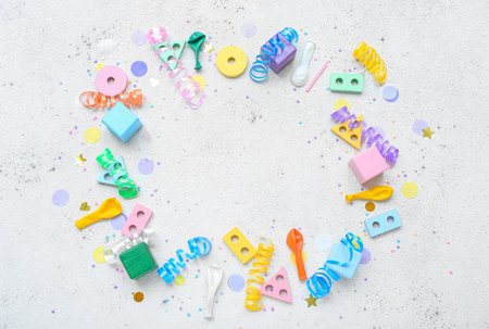 Frame made of baby toys with confetti on white background. Children's Day celebrationの写真素材