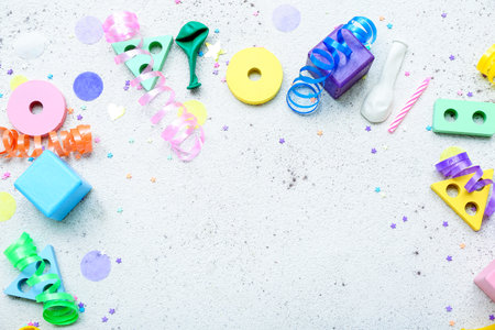 Frame made of baby toys with confetti on white background. Children's Day celebrationの写真素材