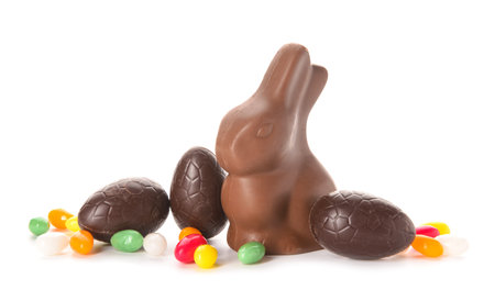 Chocolate Easter eggs, bunny and candies isolated on white background