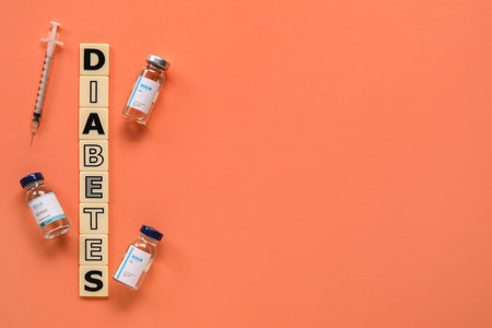 Word DIABETES with insulin and syringe on red backgroundの写真素材