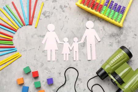 Family figure with toys on grunge background. Children's Day celebrationの写真素材
