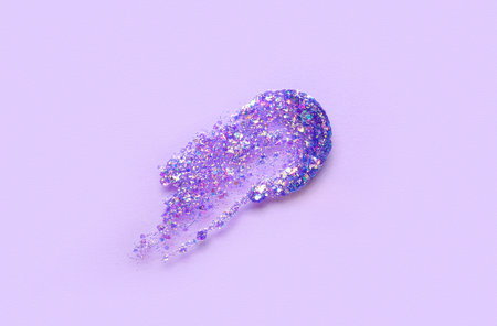 Glitter stroke on lilac backgroundの写真素材