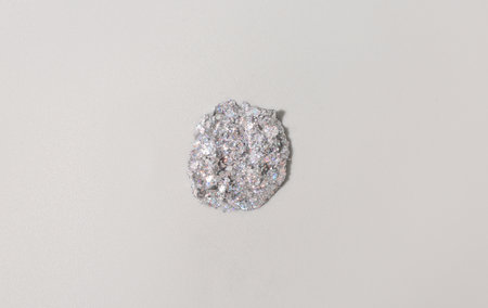 Glitter sample on gray backgroundの写真素材