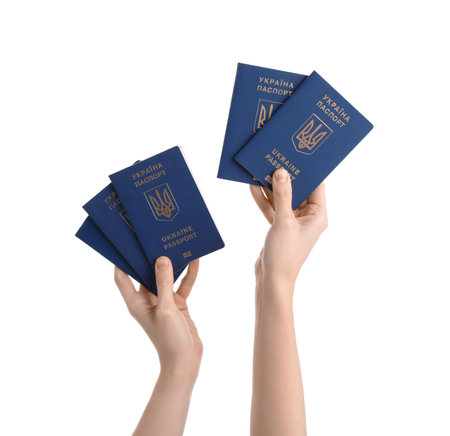 Woman with Ukrainian passports on white backgroundの写真素材