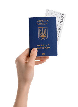 Woman with Ukrainian passport and ticket on white backgroundの写真素材