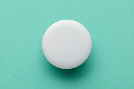 Blank white badge on turquoise background