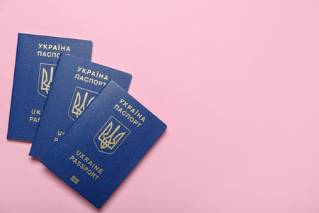 Ukrainian passports on pink backgroundの写真素材