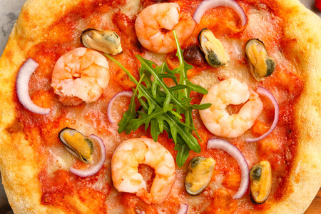 Tasty seafood pizza on table, closeupの写真素材