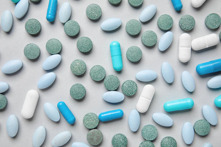 Different pills on gray backgroundの写真素材