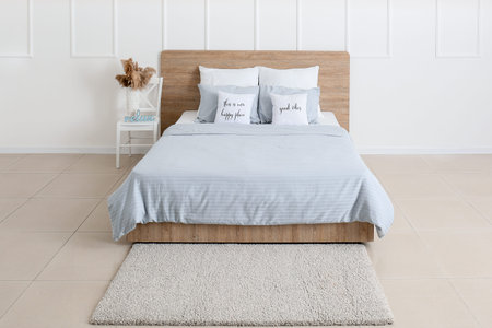 Interior of comfortable modern bedroom