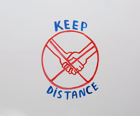 Crossed out drawing of hand shaking on white background. concept of social distance