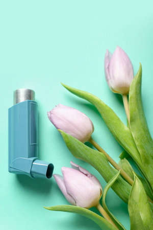 Inhaler with tulips on mint backgroundの写真素材