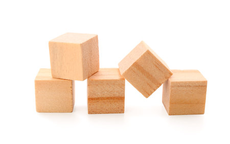 Wooden cubes isolated on white backgroundの写真素材