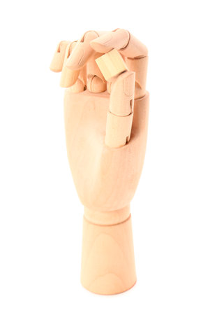 Wooden hand with cube isolated on white backgroundの写真素材