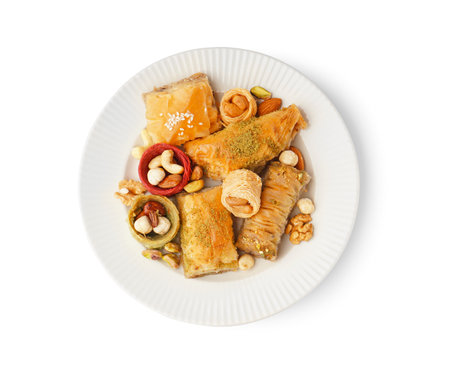 Plate with tasty baklava on white backgroundの写真素材