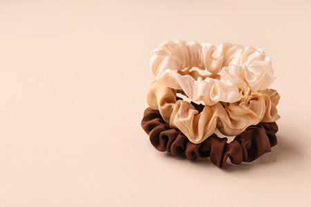 Set of stylish scrunchies on color backgroundの写真素材
