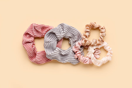 Set of different scrunchies on color backgroundの写真素材
