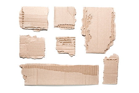 Pieces of cardboard on white backgroundの写真素材