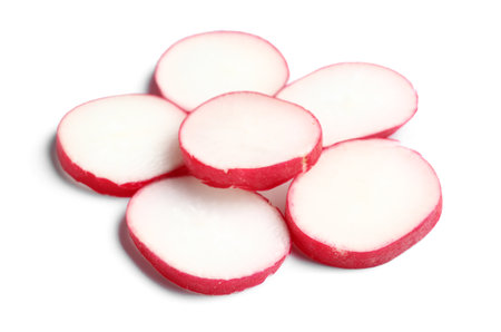 Slices of fresh radish isolated on white backgroundの写真素材