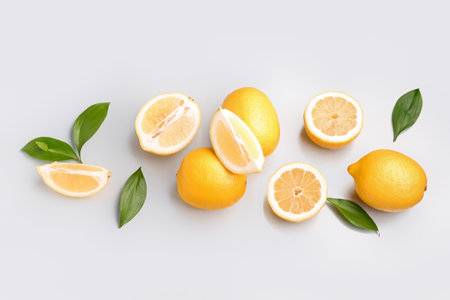 Composition with fresh lemons on gray backgroundの写真素材