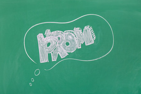 Drawn speech bubble with word PROM on green chalkboardの写真素材