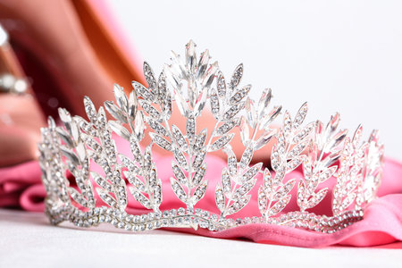 Beautiful tiara with prom dress on white table, closeupの写真素材