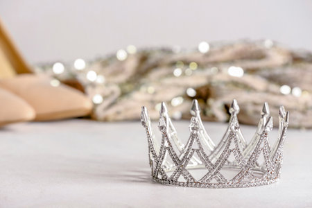 Beautiful crown on white table, closeup. Prom conceptの写真素材
