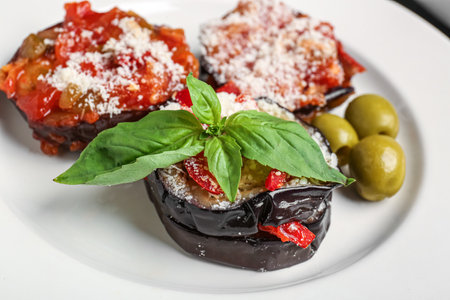 Tasty baked Eggplant Parmesan on plate, closeupの写真素材