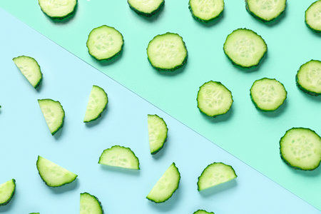 Slices of cucumber on colorful backgroundの写真素材